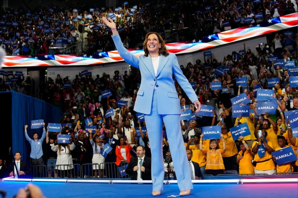 Vice President Kamala Harris waves during a campaign rally, Tuesday, July 30, 2024, in Atlanta (AP)