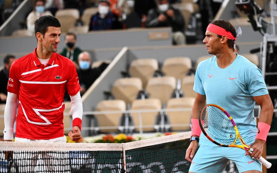 Spain's Rafael Nadal and Serbia's Novak Djokovic will play against each other on June 11, 2021 in the men's singles semi-final tennis match of The Roland Garros 2021 French Open tennis tournament in Paris. - 'I’d rather he didn’t play': Rafael Nadal jokes about Novak Djokovic, branding situation a 'circus' - GETTY IMAGES