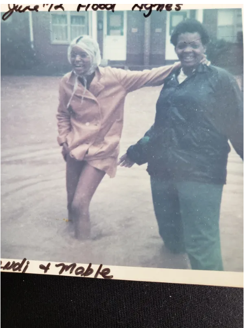 Mabel Smallwood-Reid (Sandra L. Kearse-Stockton’s sister) and Sandra are seen amid flooding caused by Tropical Storm Agnes in 1972.