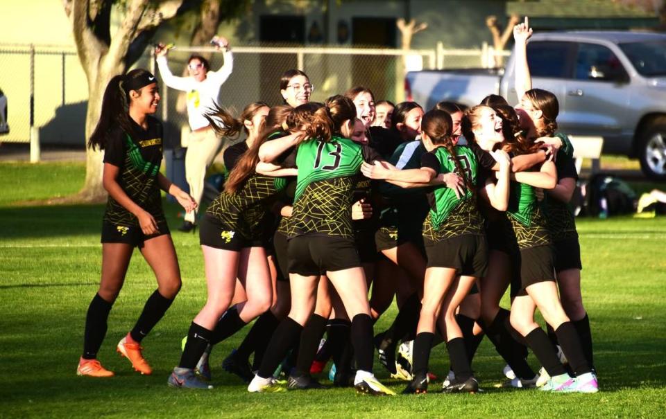 The Hilmar High School girls soccer team celebrates after defeating University Prep on penalty kicks to earn a trip to the Northern California Regional Division V championship match on Thursday, Feb. 29, 2024 at Hilmar High School.