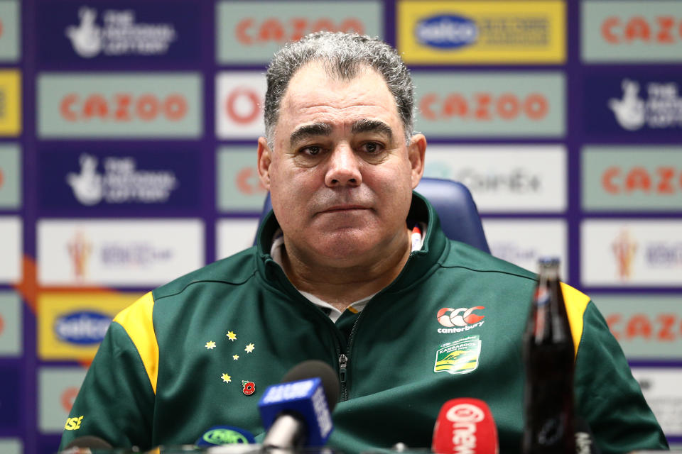 Seen here, Kangaroos coach Mal Meninga speaks to reporters at the Rugby League World Cup. 