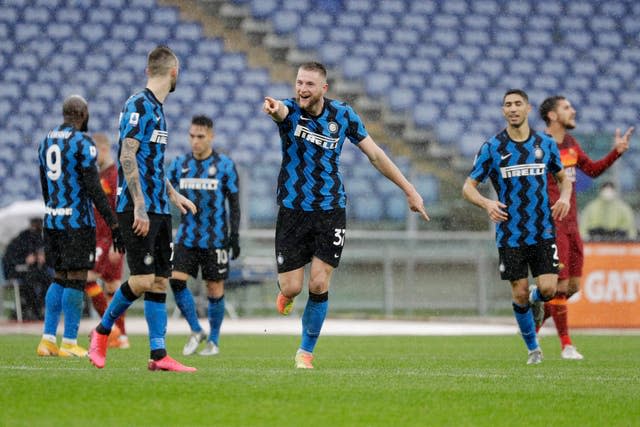 Milan Skriniar celebrates scoring for Inter