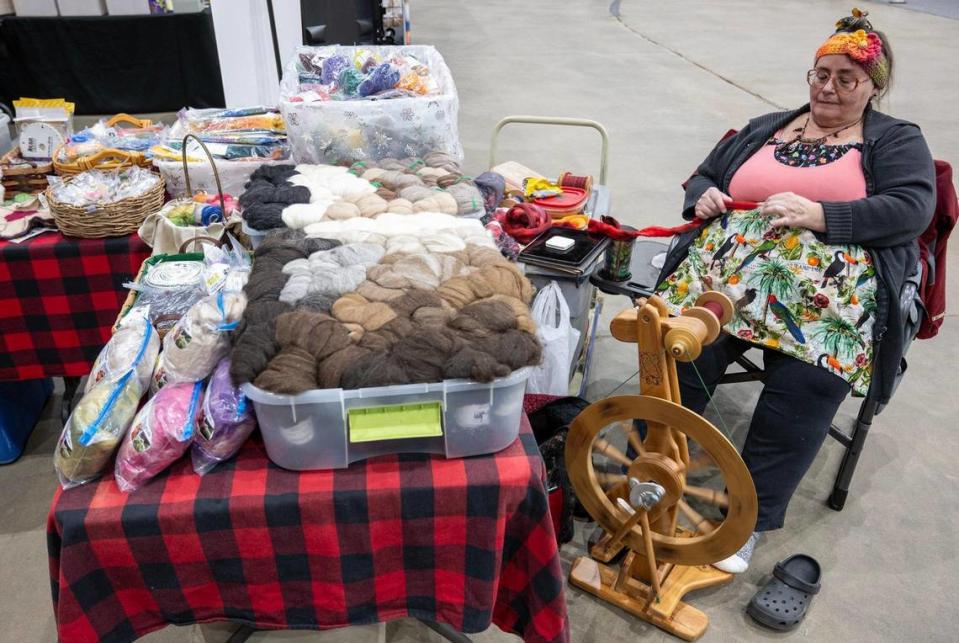“It’s very calming for me because I love it and I’m a master spinner and I just love the constant movement and the ability to draft and make the yarn exactly like I like it,” said Lorry McDonald of Oak Grove, Missouri, who was spinning alpaca wool into yarn at her booth, Black Water Treasures, at the MOPACA Invitational Alpaca Show 2024 at Hale Arena on Friday, March 22, 2024, in Kansas City. “I went to the Alberta College of Agriculture and they have a master spinner class up there and you learn all about the types of yarn and you do sheep and all kinds of animals and plant proteins along with alpaca and llama and the camelids,” said McDonald. “And you also learn about how to decide how much yarn you need for sweaters or scarves or all that stuff.” Tammy Ljungblad/tljungblad@kcstar.com