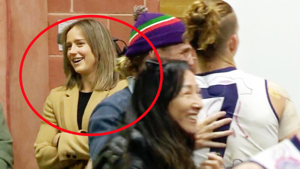 Ellyse Perry, pictured here in the Fremantle dressing rooms after Nat Fyfe's 200th game.