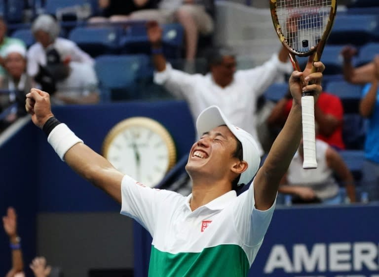 History maker: Kei Nishikori celebrates victory over Marin Cilic