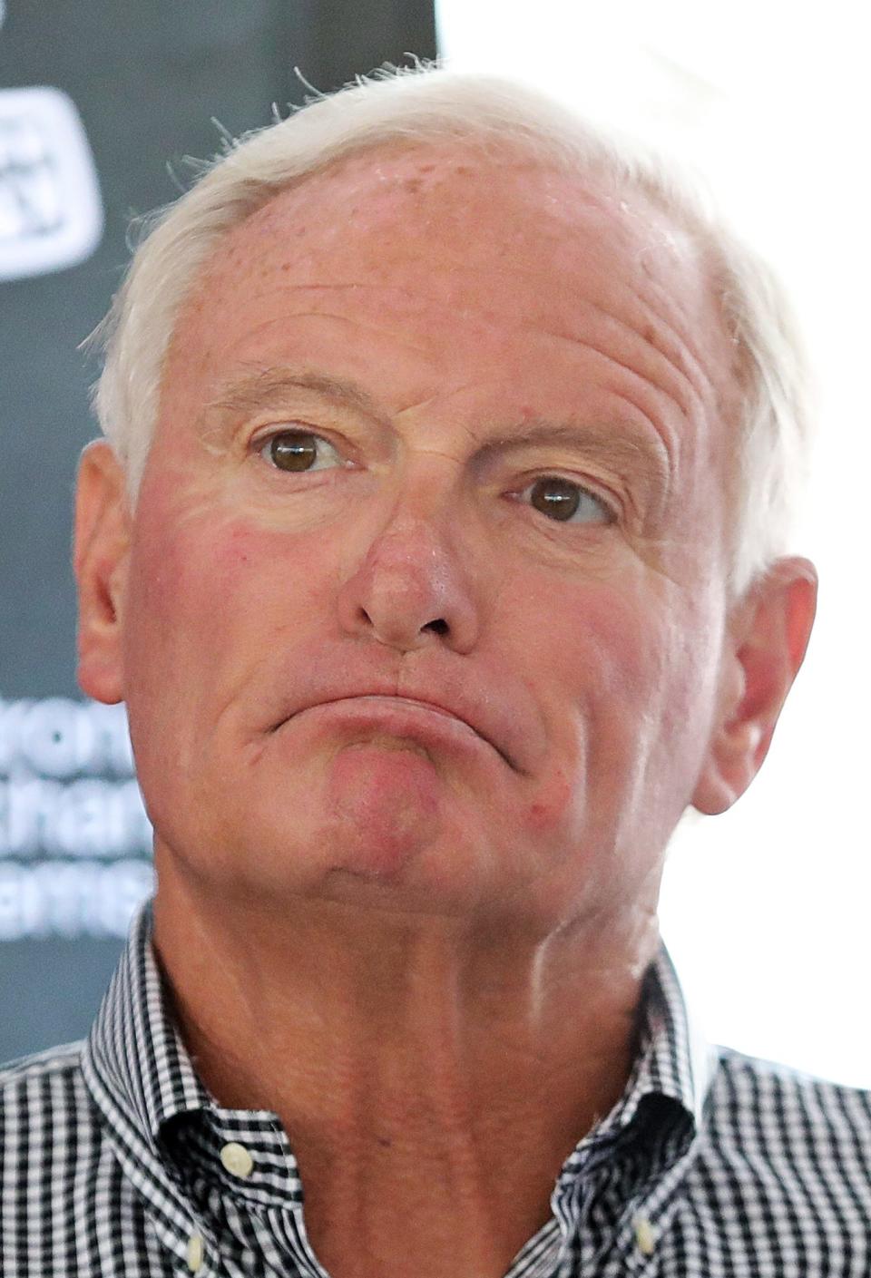 Cleveland Browns owner Jimmy Haslam listens to reporters ask about Deshaun Watson's 11-game suspension during a press conference at the NFL team's training facility in Berea on Thursday.