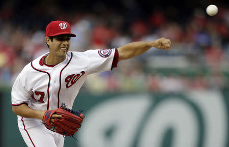 FILE PHOTO: Washington Nationals starting pitcher Gio Gonzalez throws against the Atlanta Braves in the first inning of their MLB National League baseball game in Washington August 6, 2013. REUTERS/Gary Cameron