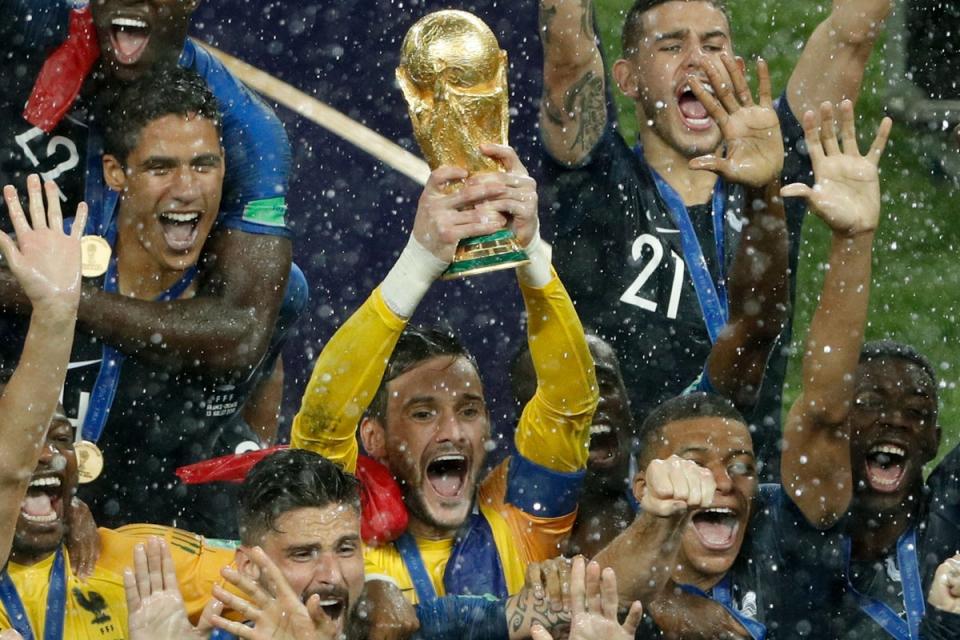 France captain Hugo Lloris lifting the trophy in Moscow, four years ago. (AFP via Getty Images)