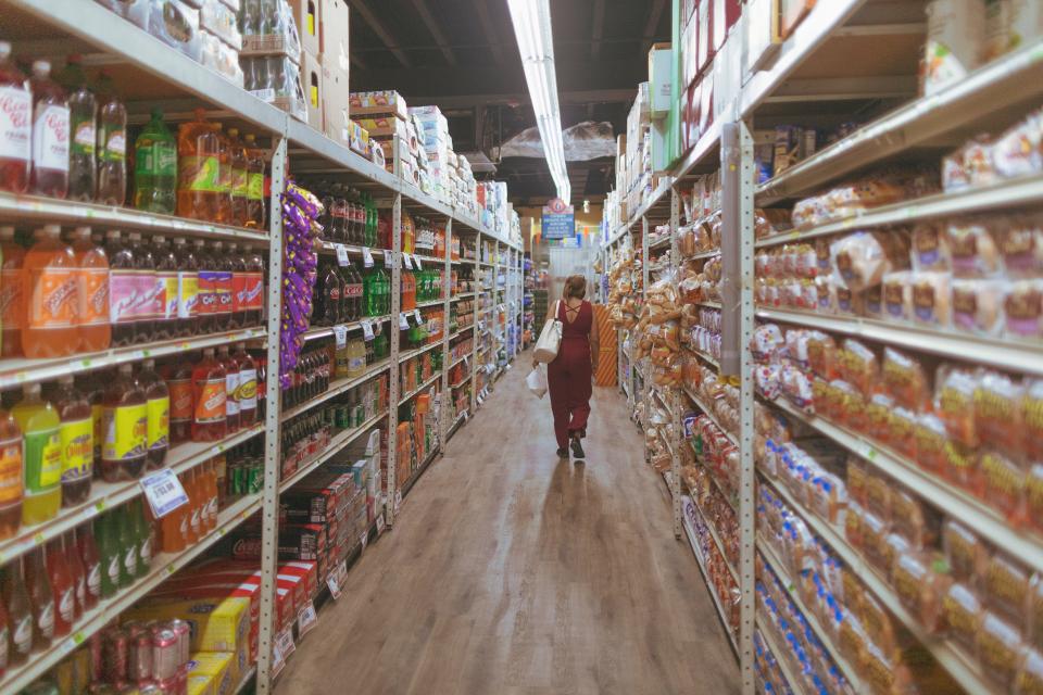 Elsa Romero shops for food at a supermarket March 16 in Miami.