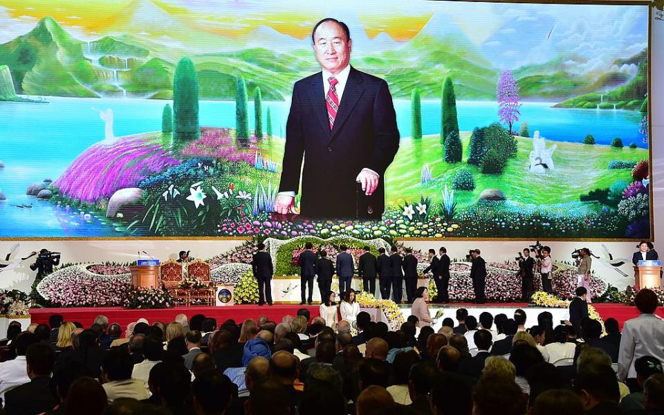 Followers of the Unification Church attend a ceremony to mark the 2nd anniversary of the church's founder Reverend Sun Myung Moon's death. Source: Getty Images