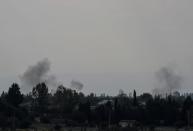 Smoke rises during the fighting over the breakaway region of Nagorno-Karabakh near the city of Terter