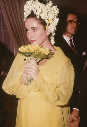 <p>Hulton Archive/Getty</p> Elizabeth Taylor at her wedding to actor Richard Burton on March 15, 1964.