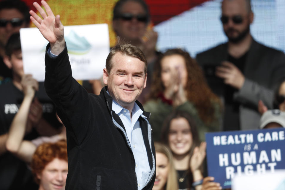 FILE - In this Oct. 24, 2018, file photo, U.S. Senator Michael Bennet, D-Colo., greets voters during a rally with young voters on the campus of the University of Colorado in Boulder, Colo. Bennet says he is seeking the Democratic nomination for president in 2020. The three-term senator made the announcement Thursday on “CBS This Morning.” He is now among more than 20 Democrats seeking the party’s presidential nomination. (AP Photo/David Zalubowski, File)