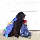 A caped Max sits patiently while Julian sets his sights on a faraway place. (Photo: Stasha Becker/Rex Features)