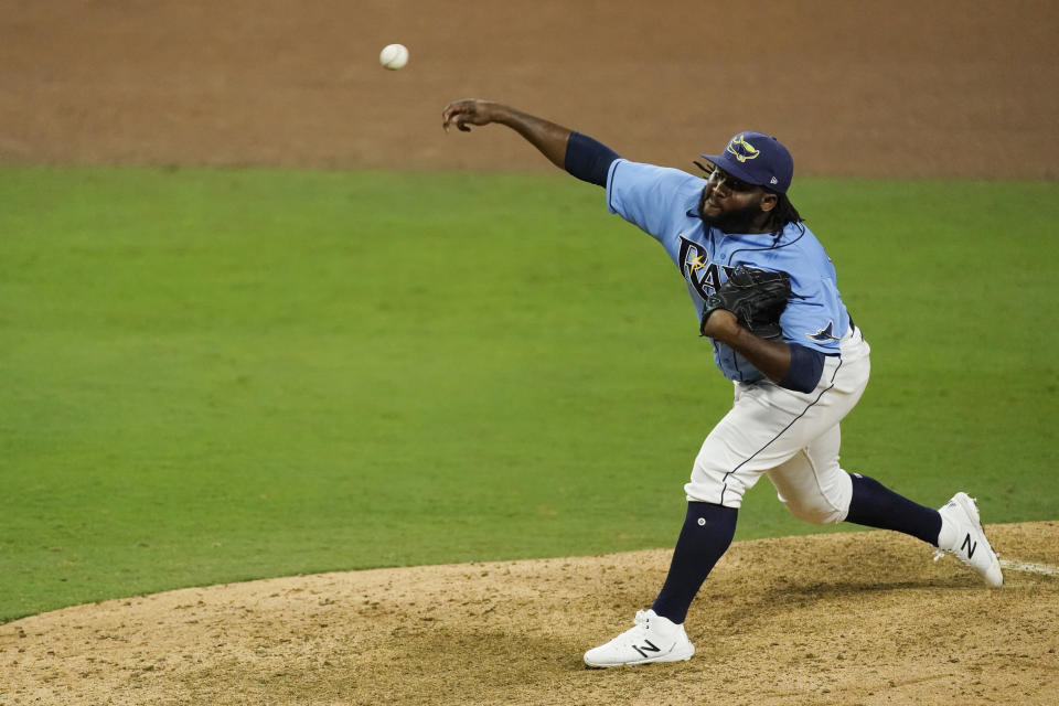 Tampa Bay Rays relief pitcher Diego Castillo pitches during the ninth inning in Game 1 of a baseball American League Championship Series against the Houston Astros Sunday, Oct. 11, 2020, in San Diego. (AP Photo/Ashley Landis)