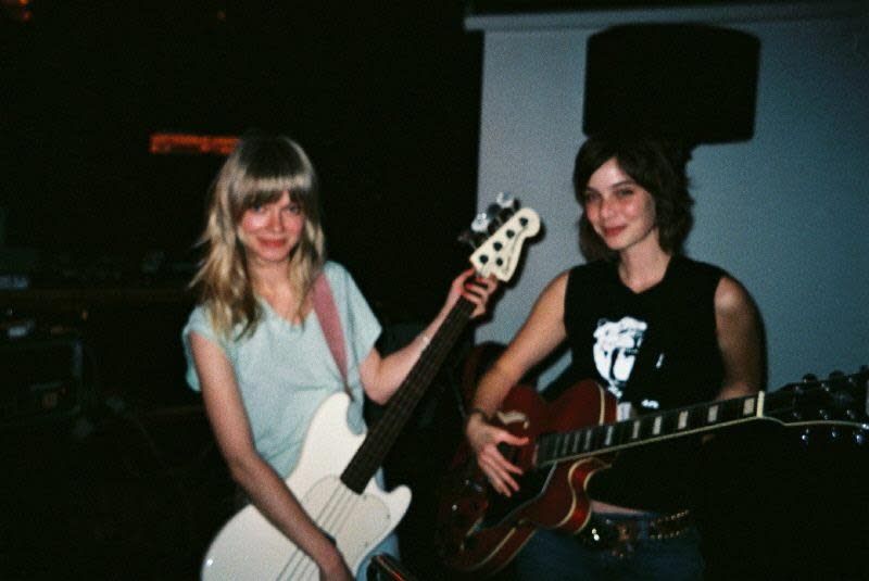 <span><strong>‘</strong>We have recorded each other a voicemail every day, often up to 20 minutes long.’ Claire and Meg standing with their guitars.</span><span>Photograph: Courtesy of Claire</span>