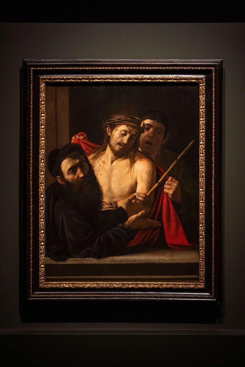"Ecce Homo" (Latin for Behold The Man) by Michelangelo Merisi da Caravaggio is unveiled to the public for the first time in Spain's Prado Museum in Madrid on Monday, May 27