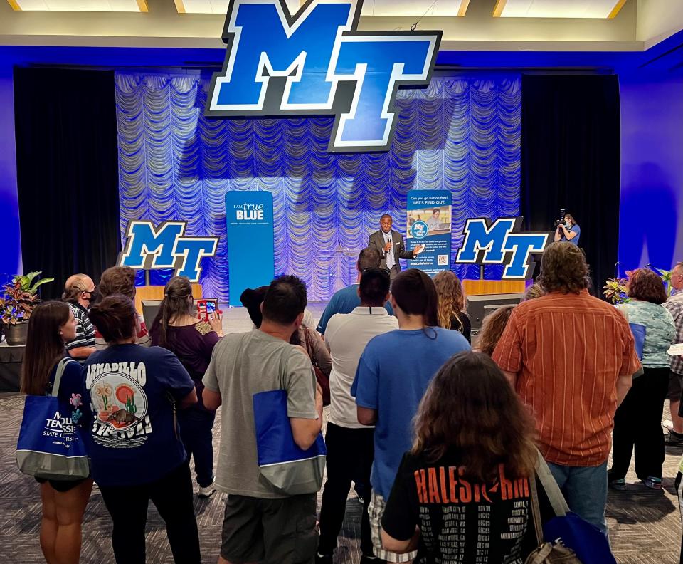 MTSU President Sidney McPhee talks to potential students and their families Wednesday night at the kickoff on home turf for the True Blue Tour, which travels to more than a dozen cities across Kentucky, Alabama, Georgia and Tennessee over the fall semester to recruit students.