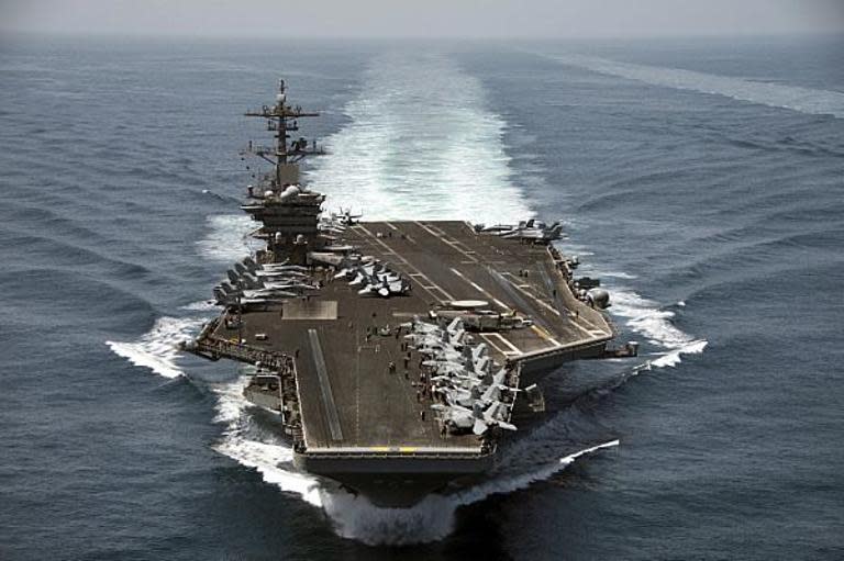 This US Navy photo released April 21, 2015, shows the aircraft carrier USS Theodore Roosevelt as it operates in the Gulf conducting maritime security operations