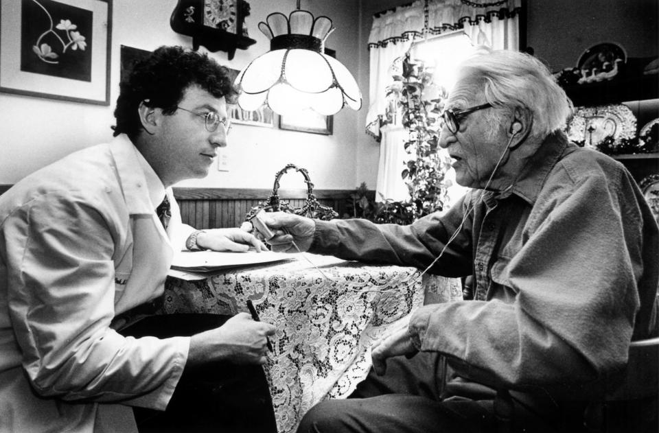 Alfred Benedetti, right, of South Quincy at age 101 in 1994 is interviewed at home for one of the first studies of centenarians by Dr. Thomas Perls, founding director of the New England Centenarian Study, now at Boston University School of Medicine. Benedetti died at age 104 in 1998.