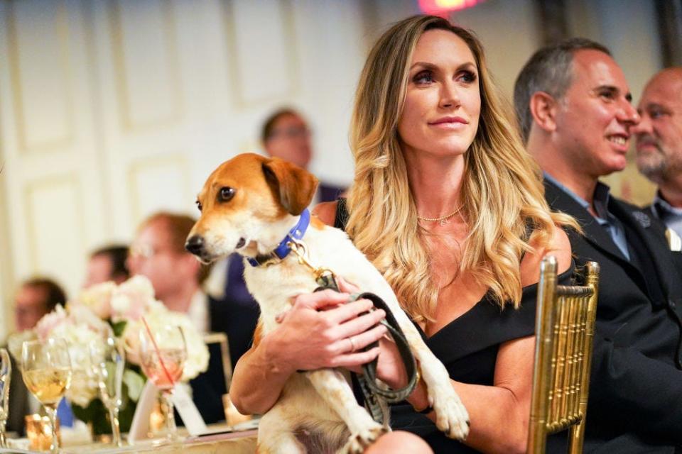 Lara Trump holds a beagle