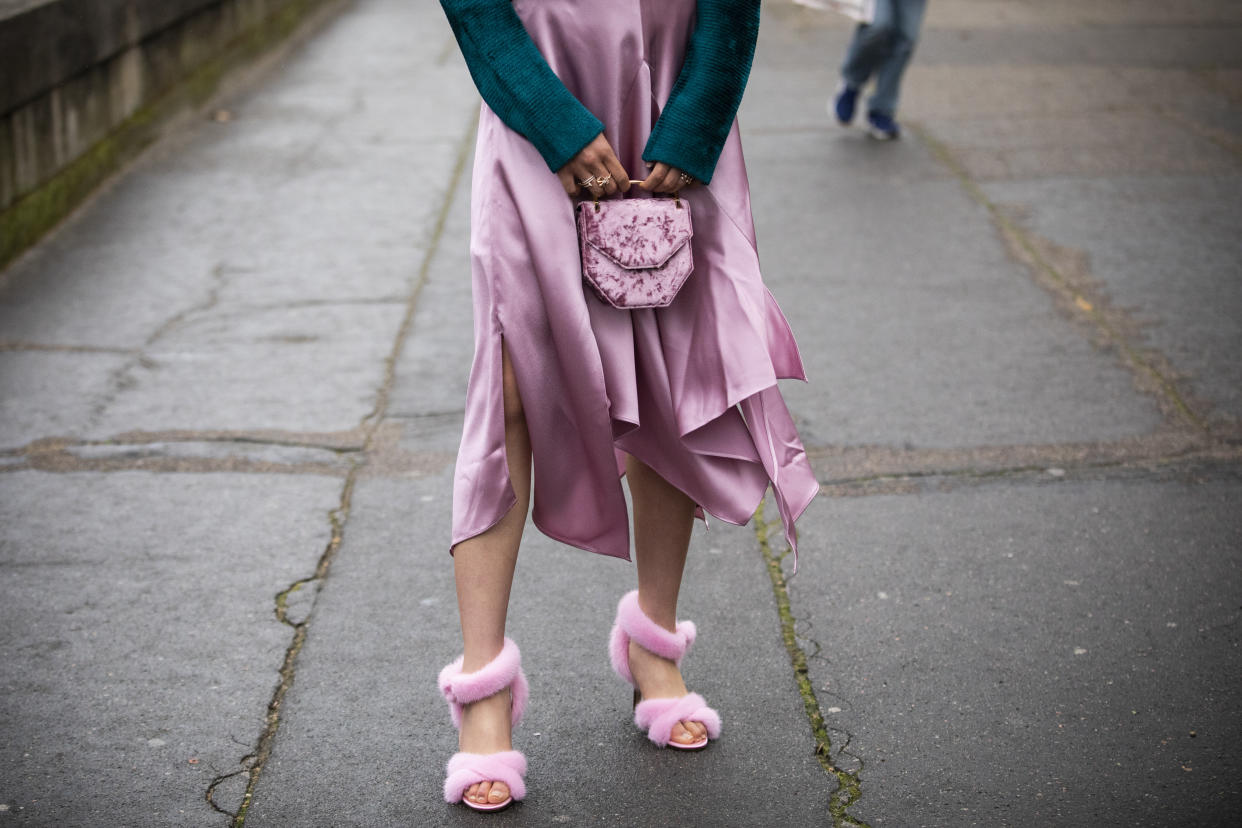 PARIS, FRANCE - MARCH 03: Jaime Xie, wearing, purple silk skirt and pink fur heels, is seen outside Valentino on Day 7 Paris Fashion Week Autumn/Winter 2019/20 on March 3, 2019 in Paris, France. (Photo by Claudio Lavenia/Getty Images)