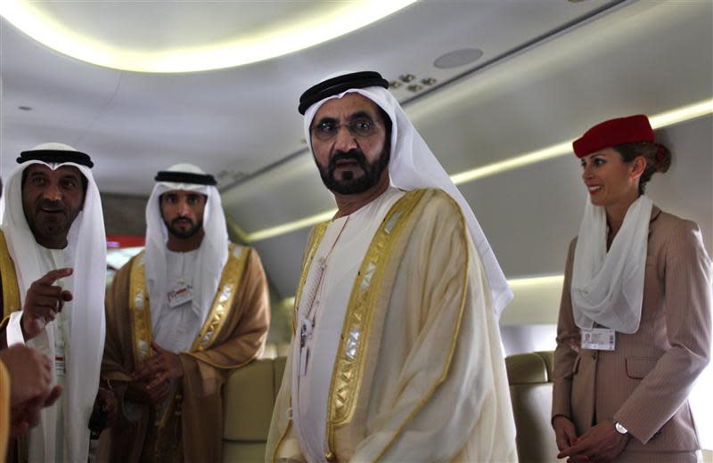 United Arab Emirates' Prime Minister and Ruler of Dubai Sheikh Mohammed takes a tour inside an Airbus A380 aircraft during the Dubai Airshow