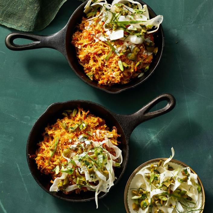 <p>These crispy, delicious latkes come together in mini cast-iron skillets, which might be the perfect way to serve everything. <br></p><p>Get the <a href="https://www.goodhousekeeping.com/food-recipes/a41754243/crispy-skillet-carrot-latkes-recipe/" rel="nofollow noopener" target="_blank" data-ylk="slk:Crispy Skillet Carrot Latkes recipe" class="link "><strong>Crispy Skillet Carrot Latkes recipe</strong></a>. </p>