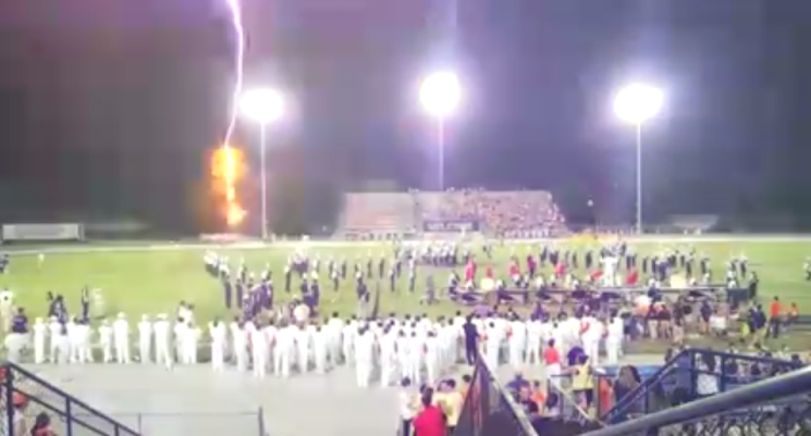 Lightning strikes directly behind the Boone football team during halftime of a game — Orlando Sentinel screenshot