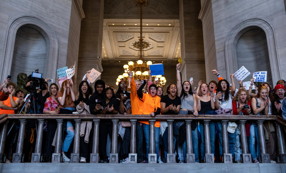 People protest inside the Tennessee State Capitol to call for an end to gun violence and support stronger gun laws (Seth Herald / Getty Images)