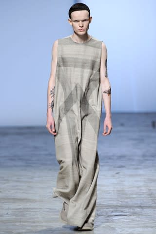 <div class="caption-credit"> Photo by: Getty Images</div>Reentering the world of dresses takes time. They can't just leap right into Herve Leger bandages. As Rick Owens' 2012 line illustrates, the male dress is currently positioned somewhere around the <a rel="nofollow" href="http://shine.yahoo.com/fashion/closer-to-fine-lilith-fair-fashions-from-the-90s-2023336.html" data-ylk="slk:beginning of Lilith Fair;elm:context_link;itc:0;sec:content-canvas;outcm:mb_qualified_link;_E:mb_qualified_link;ct:story;" class="link  yahoo-link">beginning of Lilith Fair</a>. <br>