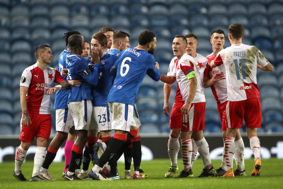 Tempers flare during the UEFA Europa League Round of Sixteen match at Ibrox Stadium, Glasgow. Picture date: Thursday March 18, 2021.