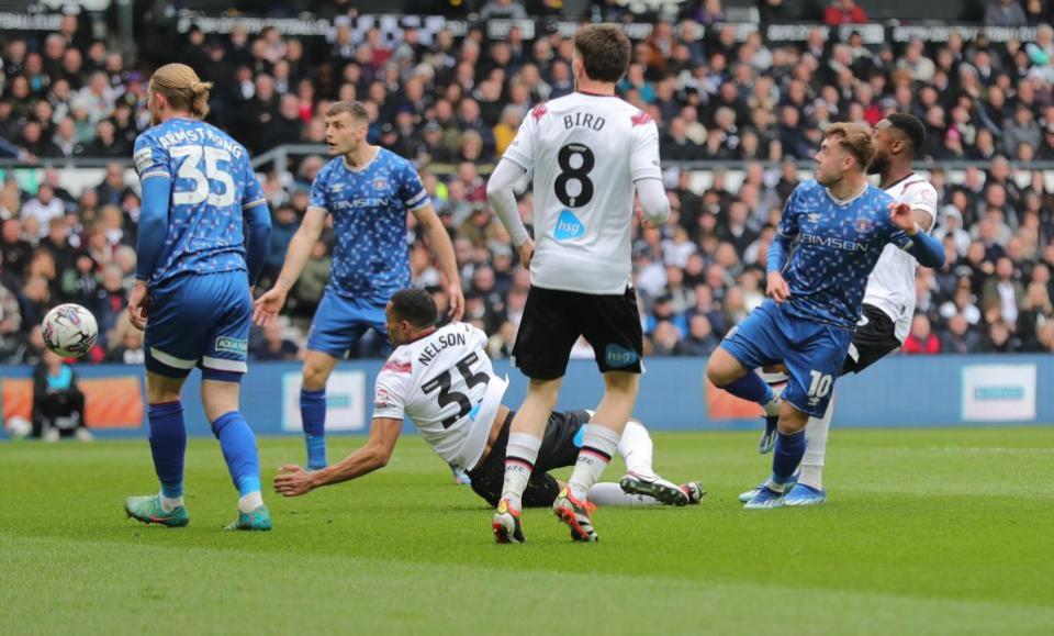 News and Star: United saw penalty appeals turned down at Derby when Alfie McCalmont had shots blocked