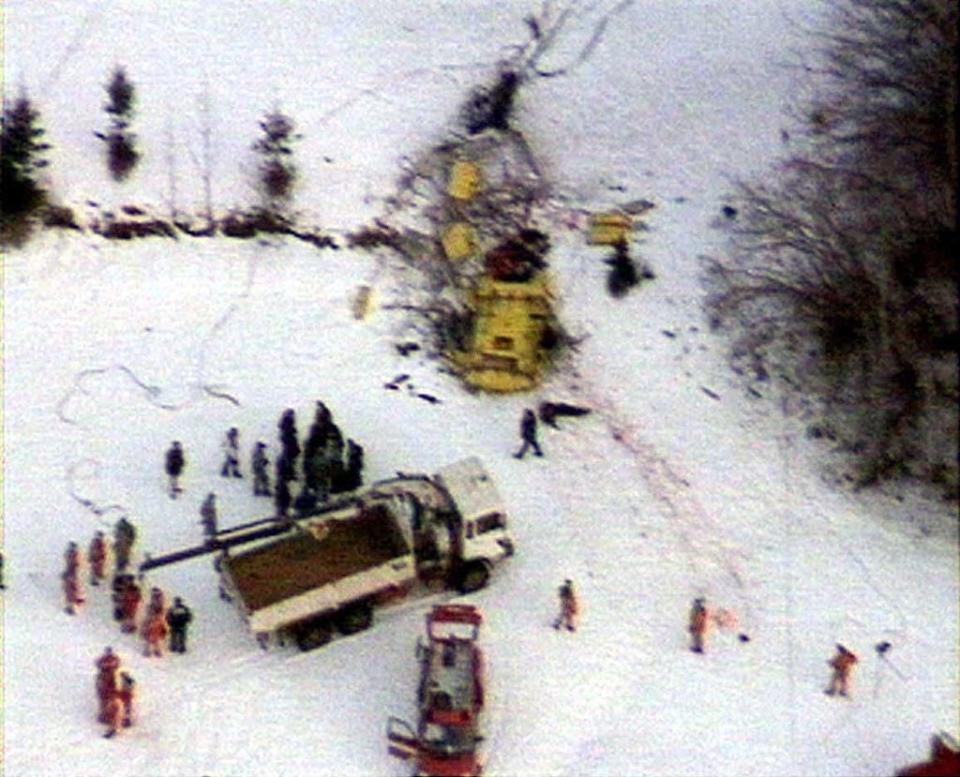 At least 14 people were killed and several injured when a U.S. military plane cut a cable car line over an Italian ski resort, 2/3/98