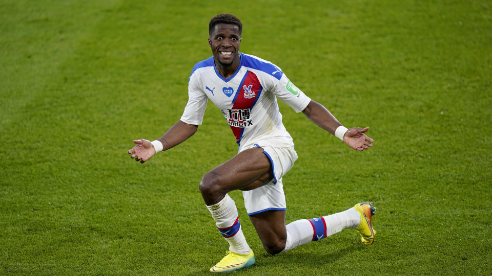 Crystal Palace's Wilfried Zaha reacts during the English Premier League soccer match between Bournemouth and Crystal Palace at Vitality Stadium in Bournemouth, England, Saturday, June 20, 2020. (AP Photo/Will Oliver,Pool)