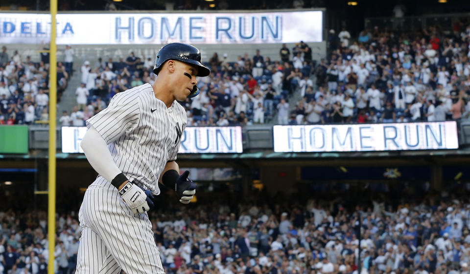 Aaron Judge #99 of the New York Yankees runs the bases after his second inning two run home run in an MLB game against the Seattle Mariners