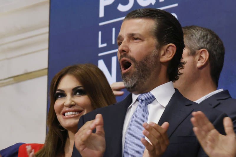 Donald Trump Jr. and Kimberly Guilfoyle help ring the opening bell at the New York Stock Exchange on Wall Street in New York City on Thursday as PublicSq began trading on the exchange under the ticker symbol PSQH. Photo by John Angelillo/UPI