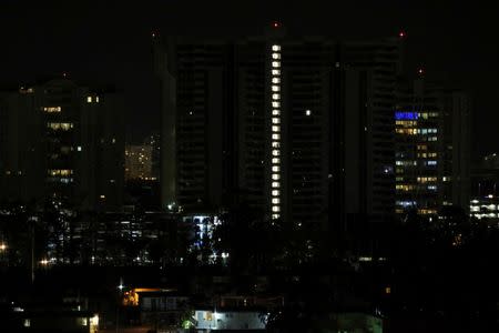 A general view shows buildings after Puerto Rico Electric Power Authority (PREPA), the island's power company, said Wednesday that a major power line failure in southern Puerto Rico cut electricity to almost all customers, in San Juan, Puerto Rico April 18, 2018. REUTERS/Gabriel Lopez Albarran