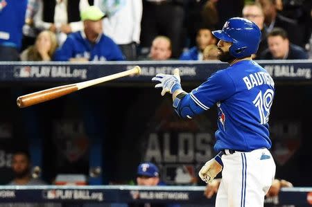 Oct 14, 2015; Toronto, Ontario, CAN; Toronto Blue Jays right fielder Jose Bautista (19) reacts after hitting a three run home run during the seventh inning against the Texas Rangers in game five of the ALDS at Rogers Centre. Mandatory Credit: Dan Hamilton-USA TODAY Sports