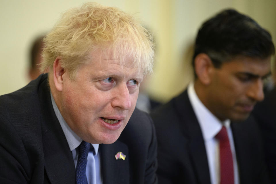 FILE - Britain's Prime Minister Boris Johnson addresses his Cabinet during his weekly Cabinet meeting in Downing Street on Tuesday, June 7, 2022 in London. Conservative lawmakers voted by 211 to 148 to back Johnson as leader, but the scale of the revolt was considered more damaging than expected. If Johnson's opponents manage to push him out, or if he resigns, the party would hold a leadership contest to choose his replacement. (Leon Neal/Pool Photo via AP, FIle)