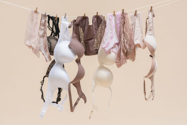 <p>Getty</p> Hanging bras and underwear