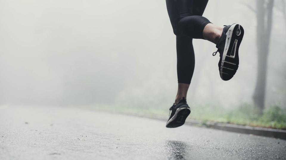 runner on wet road