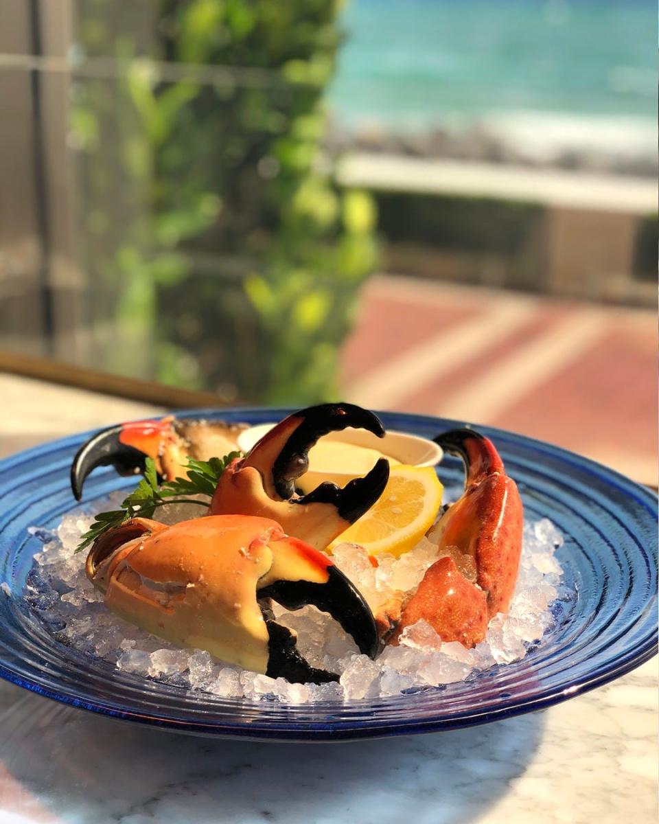 Stone crab claws at The Breakers' The Seafood Bar are served with a house-made mustard sauce.