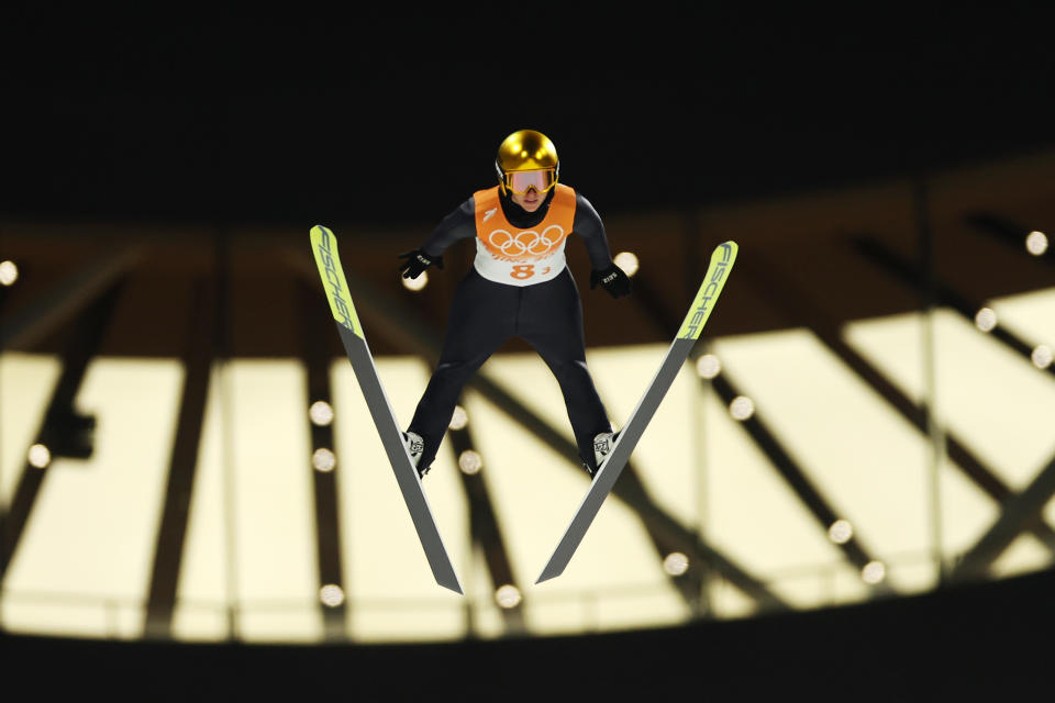 Katharina Althaus (pictured) jumps during Mixed Team Ski Jumping First Round.