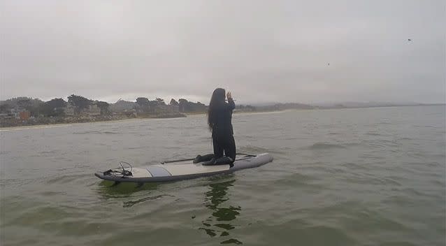 Viviana Guzman experiences a close encounter with a huge whale while playing the flute for it. Picture: YouTube/Viviana Guzman