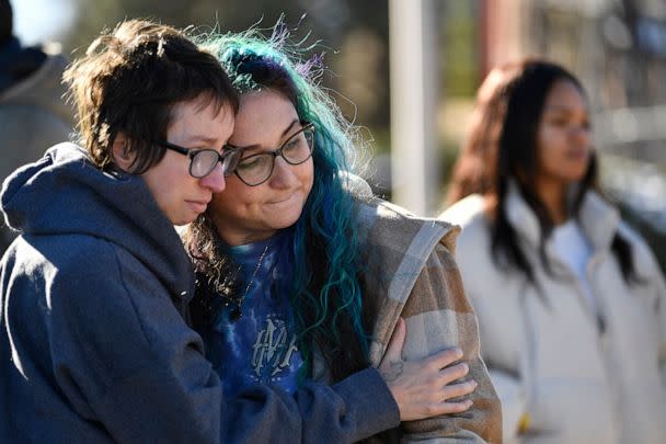 PHOTO: Jessy Smith Cruz embraces Jadzia Dax McClendon the morning after a mass shooting at Club Q, an LGBTQ nightclub in Colorado Springs, Colo.,  Nov. 20, 2022. (Jason Connolly/AFP via Getty Images)
