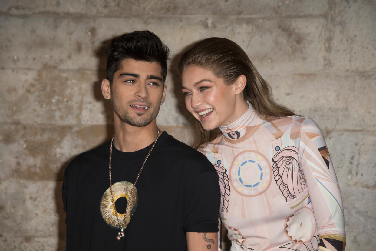 Zayn Malik and Gigi Hadid attend the Givenchy show on Oct. 2, 2016, in Paris. (Dominique Charriau via Getty Images)