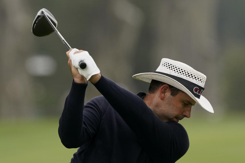 Charl Schwartzel hits his tee shot on the 10th hole during the final round of the PGA Championship golf tournament at TPC Harding Park Sunday, Aug. 9, 2020, in San Francisco. (AP Photo/Charlie Riedel)