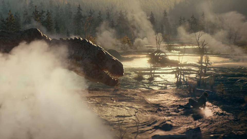 Adam Driver being approached by a T-Rex in 65