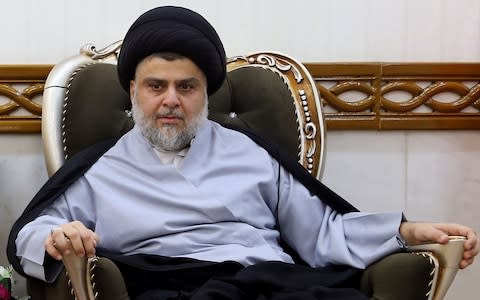 Iraqi Shiite cleric and leader Moqtada al-Sadr has demanded the government resign  - Credit: AFP